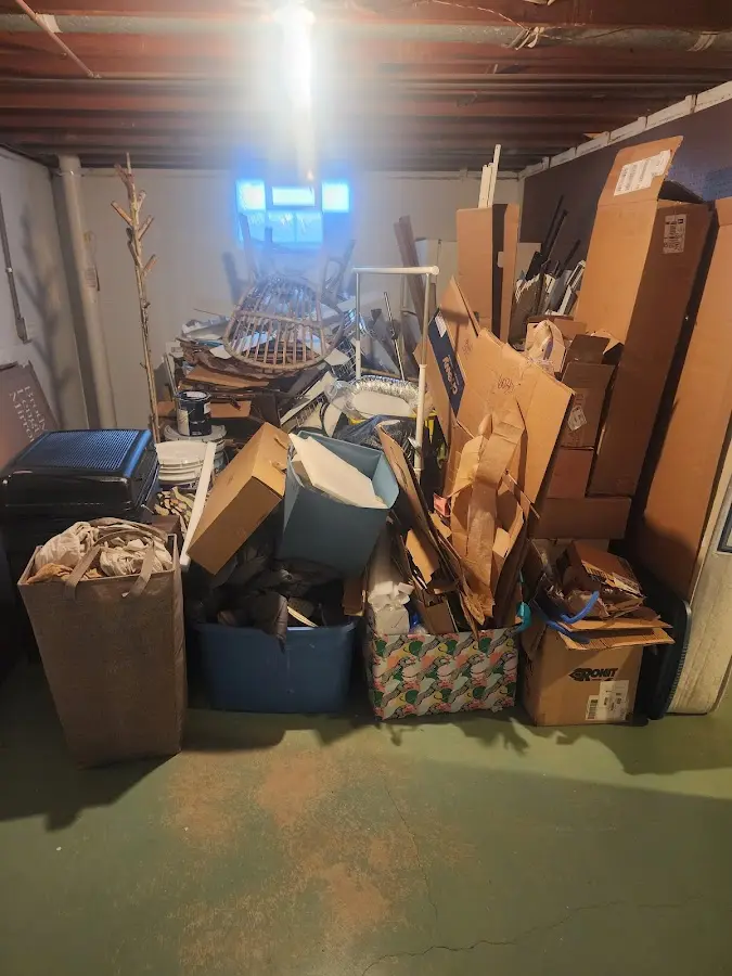 Roll-off dumpster container at job site for 2 Yard Dumpster Rental in Kannapolis